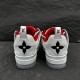 Rear view of L Skate Leather Trainers in white and red displaying heel tabs