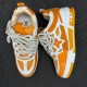 L Skate Chunky Trainers in yellow and white leather overhead view L Skate Chunky Trainers in yellow and white leather overhead view
