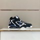 Studio Side View of L Trainer High Top Black White Blue Trainers Studio side view showing the black and white upper with blue branding