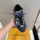 Top-Down View of L Trainer High Top Black White Blue Trainers Top-down view focusing on the toe box, laces and ankle strap in black and white