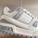 L Trainer Maxi Low Top Sneakers Grey White Detail View L Trainer Maxi low top sneakers in grey and white leather close up panel detail