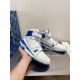 L High Top Trainer Sneaker Boot White Blue Handheld View Three-quarter front angle of L high top trainer sneaker boot in white and blue being held