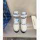 L High Top Trainer Sneaker Boot White Blue Front View Front view showing laces and ankle strap of L high top trainer sneaker boot in white and blue