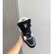 L High Top Trainer Leather Sneakers In Black And White - Top View Top-down view focusing on the black and white L high top trainer collar, laces, and perforated toe box