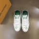 L Trainer Low Top White And Green Graphic Print Leather Sneakers front facing pair composition L Trainer Low Top White And Green Graphic Print Leather Sneakers front facing pair composition