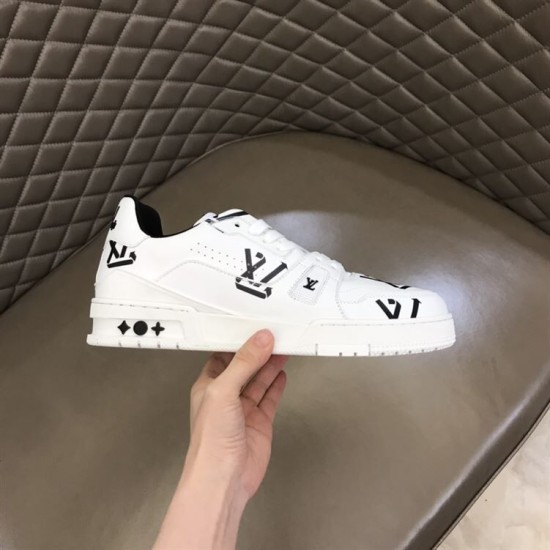 L Monogram Print Leather Low Top Trainers White Black Single Side View L Monogram Print Leather Low Top Trainers White Black single shoe side profile held