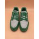 L Trainer Low Top Leather Trainers In Green And Grey - Front Overhead Front overhead view of L trainers in green and grey displaying tongue branding