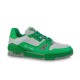 L Trainer Low Top Leather Trainers In Green And Grey - Studio Profile Studio profile of L low top trainer in green and grey on white backdrop