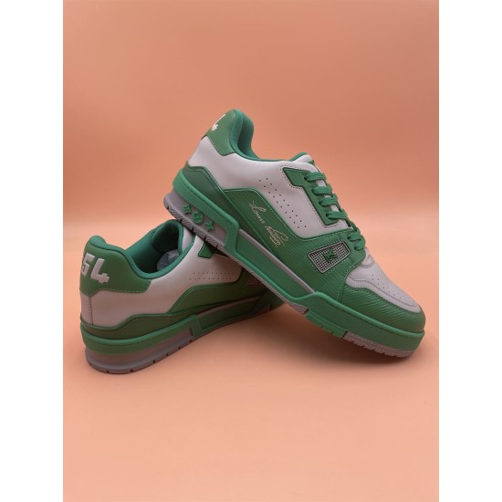 L Trainer Low Top Leather Trainers In Green And Grey - Rear Angle Rear angle view of L trainers in green and grey highlighting heel branding