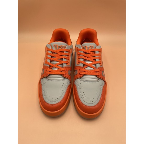 Front View of L Orange And Grey Low Top Trainer Sneakers Front view of L orange and grey low top trainer sneakers highlighting lace-up closure