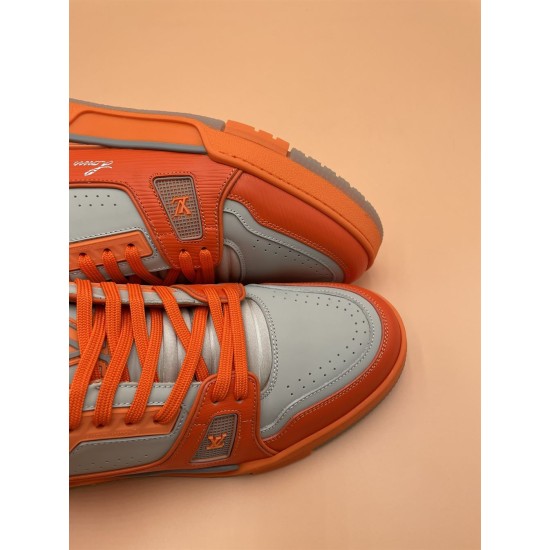 Toe Box Detail of L Orange And Grey Low Top Trainer Sneakers Close-up of toe box and eyelets on L orange and grey low top trainer sneakers