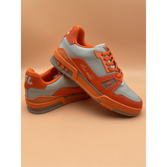 Dynamic Angle of L Orange And Grey Low Top Trainer Sneakers Dynamic angled display of L orange and grey low top trainer sneakers