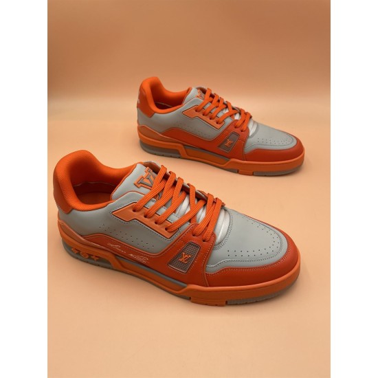 Overhead Angle of L Orange And Grey Low Top Trainer Sneakers Overhead perspective of L orange and grey low top trainer sneakers on display