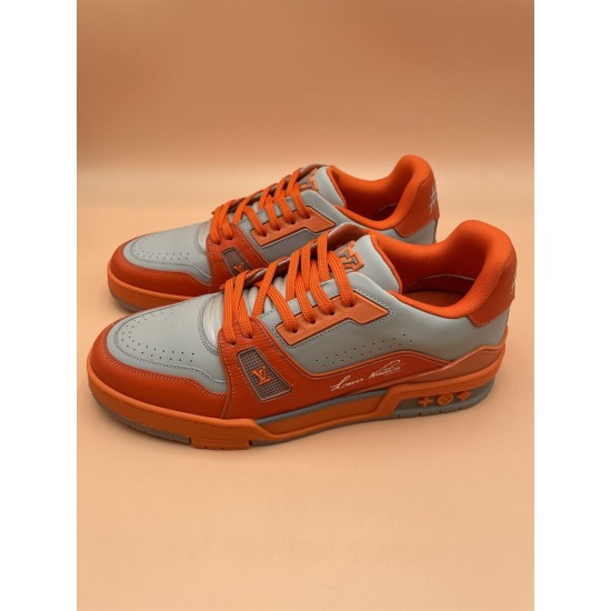 Paired View of L Orange And Grey Low Top Trainer Sneakers Angled pair arrangement of L orange and grey low top trainer sneakers