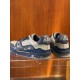 Rear view of L Trainer grey and navy blue leather sneakers featuring heel numbers