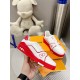 L Trainer Low Top Leather White Red Trainers Side Detail in Hand Hand holding L Trainer Low Top Leather White Red Trainers showing outer side