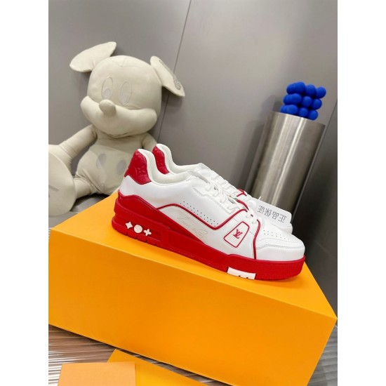 L Trainer Low Top Leather White Red Trainers Box Display L Trainer Low Top Leather White Red Trainers resting on an orange shoe box