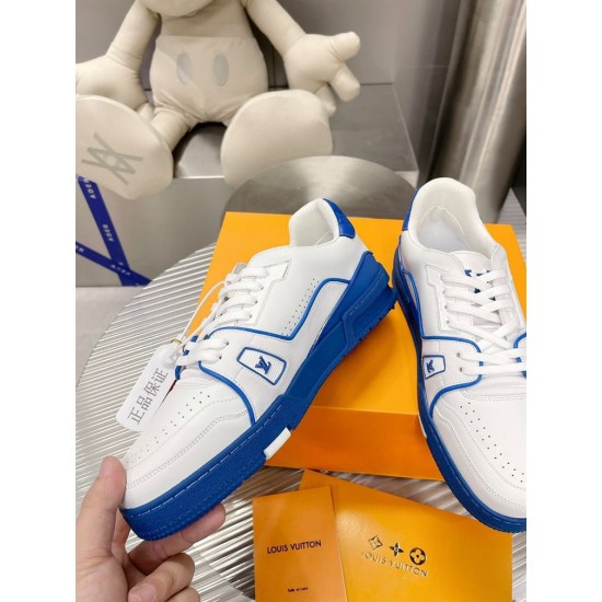 Close-up perspective of L Trainer Low Top Leather White And Blue Sneakers side branding