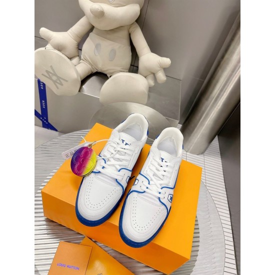 Top-down view of L Trainer Low Top Leather White And Blue Sneakers laces and toe boxes