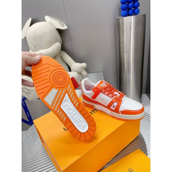 Underside view showcasing the patterned rubber sole of L Trainer Low Top Orange And White Leather Sneakers