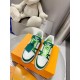 L Trainer Sneaker In Green And White Monogram Leather Top View Top-down view of a pair of L Trainer Sneakers in green and white with vibrant laces
