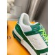L Trainer Sneaker In Green And White Monogram Leather Collar Detail Close-up of the collar, heel lining and side monogram leather of the green and white trainer