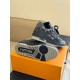 L Monogram Denim Low Top Trainer Sneakers Outsole View in denim and black Bottom sole and rear view of L Monogram Denim Low Top Trainer Sneakers in denim and black