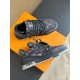 L Monogram Denim Low Top Trainer Sneakers Top View in denim and black Top down view of L Monogram Denim Low Top Trainer Sneakers pair on box in denim and black