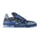 Studio Side Profile - L Blue Denim Monogram Low Top Trainer Sneakers Clean studio profile view of L blue denim monogram low top trainer sneakers