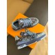 Top-Down View - L Blue Denim Monogram Trainers Top down bird-eye perspective of L blue denim monogram trainers