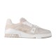 L Beige Low Top Trainer Profile View in beige and white Profile view of L beige low top trainer showing monogram canvas and white sole