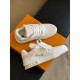 L Beige Low Top Trainers Overhead Layout in beige and white Overhead layout of L beige low top trainers with white laces and tag
