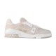 L Beige Low Top Trainer Studio Profile in beige and white Studio side profile of L beige low top trainer on a neutral background in beige and white
