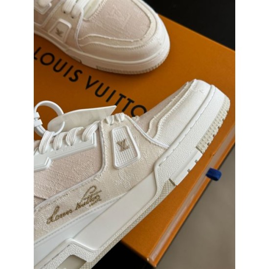 L Beige Trainer Toe Box Detail in beige and white Forefoot close-up of L beige trainer highlighting perforated toe box panels in beige and white