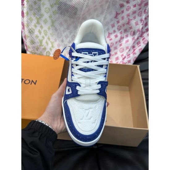 Close-up front angle of L Trainer Rhinestone Blue White Leather Low Top Sneakers showing lace loops