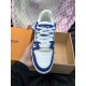 Close-up front angle of L Trainer Rhinestone Blue White Leather Low Top Sneakers showing lace loops