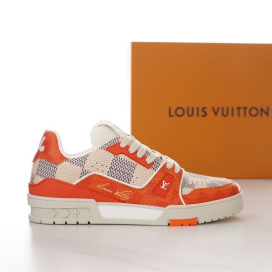 L Trainer Sneaker In Orange And White Damier Print Angled Side View Angled view of L Trainer Sneaker In Orange And White Damier Print showing side branding