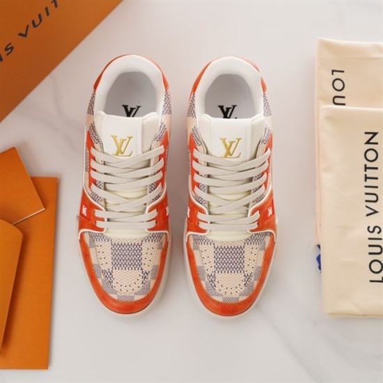 L Trainer Sneaker In Orange And White Damier Print Top View Top-down view of L Trainer Sneaker In Orange And White Damier Print showing laces and tongue