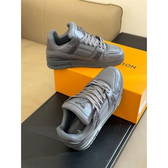 Top-down perspective showing the padded tongue and interior lining of the grey L trainers in monochrome and grey