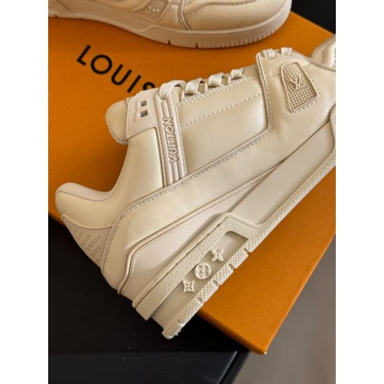 L Trainer Low Top Beige Leather Sneakers - Side Detail L Trainer Low Top Beige Leather Sneakers close up of side branding and midsole