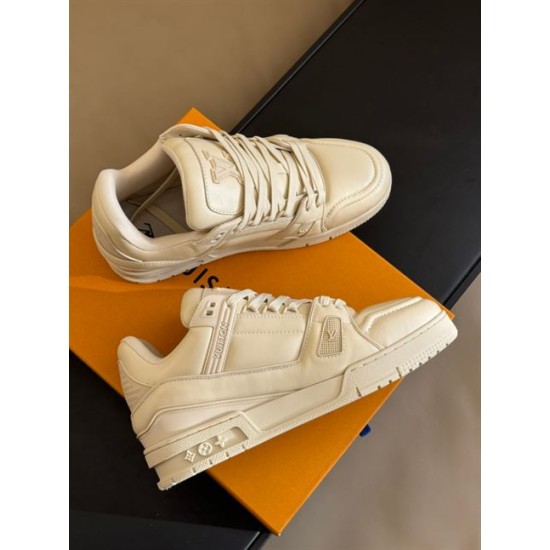 L Trainer Low Top Beige Leather Sneakers - Dual Pair Overhead L Trainer Low Top Beige Leather Sneakers dual pair overhead arrangement