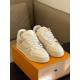 L Trainer Low Top Beige Leather Sneakers - Laces and Tongue L Trainer Low Top Beige Leather Sneakers close up on laces and tongue