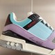 Close-up detail of the side panel on the L Trainer Sneaker in light blue and purple