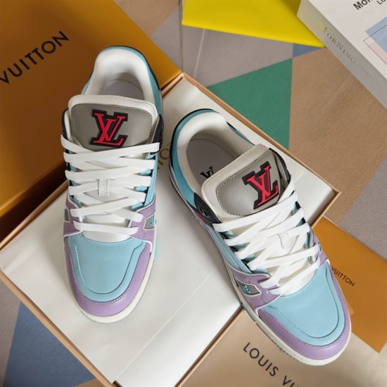 Pair of L Trainer Sneakers in light blue and purple viewed from above showing tongues
