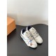 L Trainer Sneaker Low Top Leather White Navy Front Angle L Trainer Sneaker Low Top Leather White Navy angled front view on dark surface
