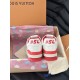 Rear view of L white and red leather trainers showing #54 branding