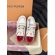 Top view of L white and red leather trainers with laces
