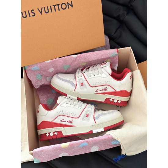 Pair of L white and red leather trainers inside a branded box