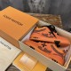 L Orange Mesh Rhinestone Low Top Trainers in Box L orange mesh rhinestone low top trainers neatly arranged inside branded orange packaging