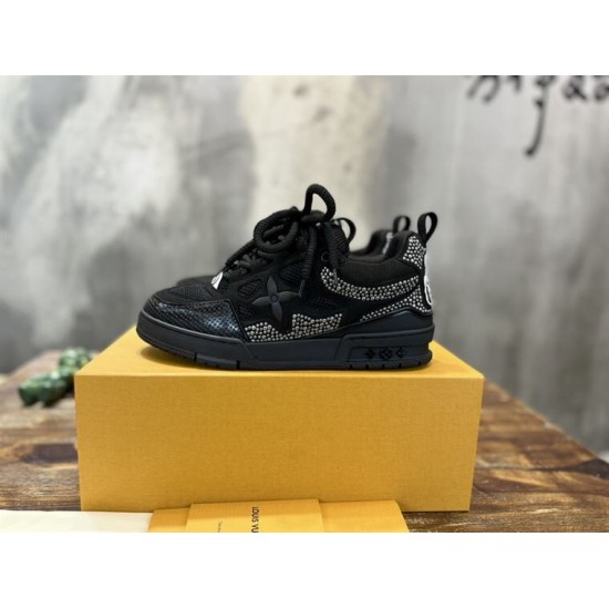 L Black Embellished Chunky Low Top Trainers displayed on a box
